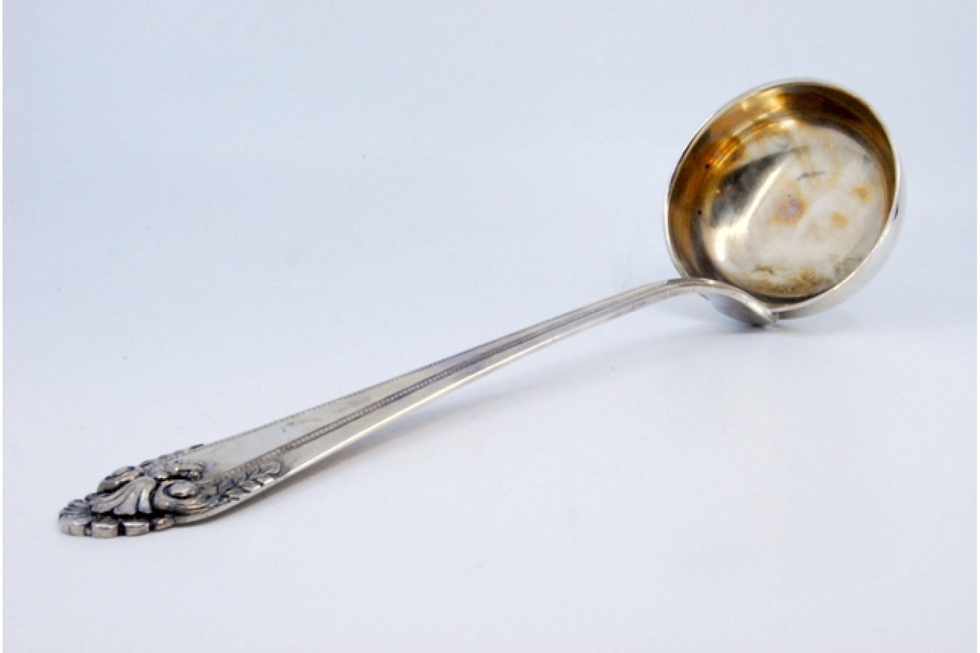 European Silver soup ladle with reliefs and friezes on the handle For Sale