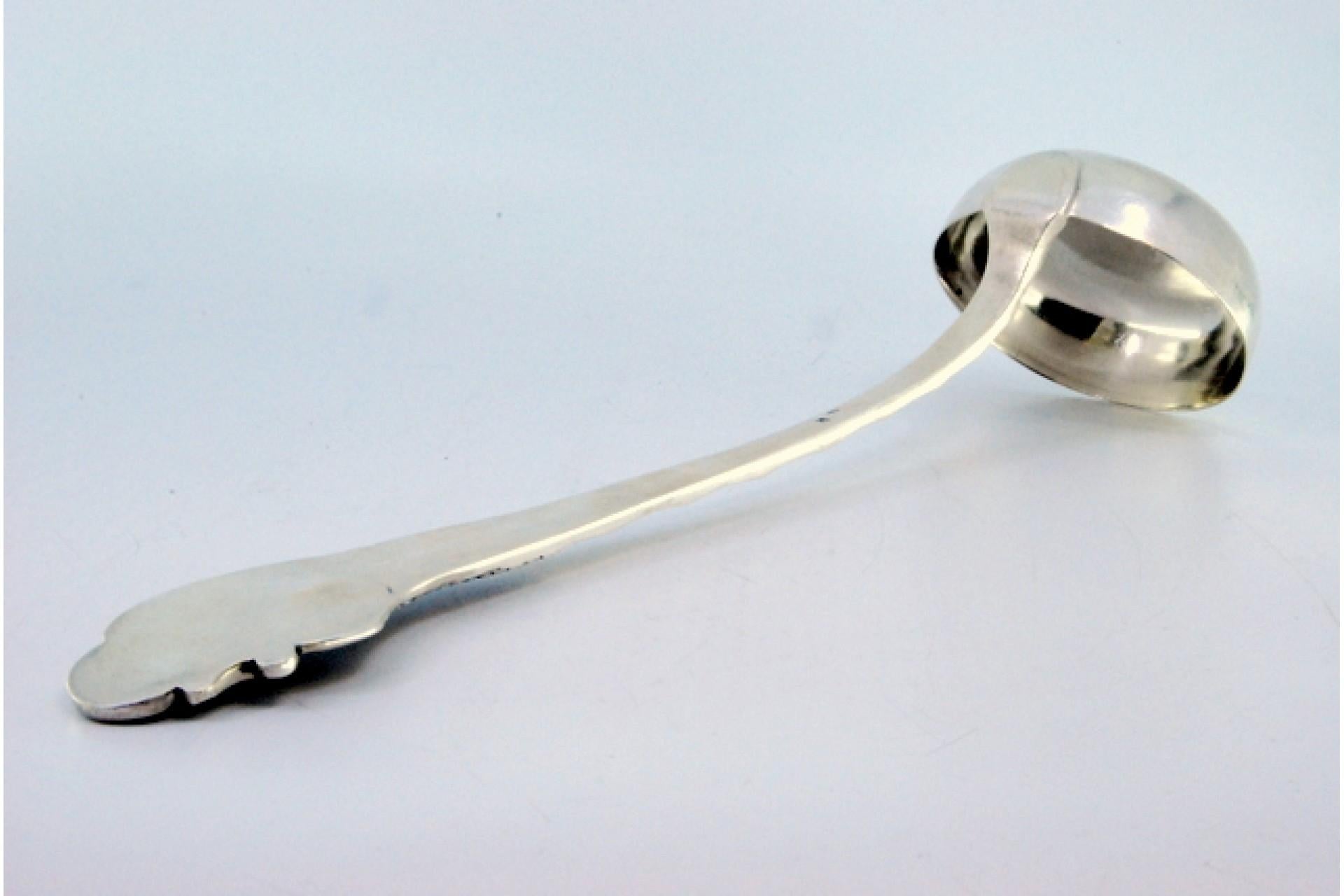 Description: Silver soup ladle with wavy reliefs on the handle surrounding a monogram card. Metal: Silver. Origin: Portuguese. Brand: Javali II Title. Weight: 240.01 grams. Dimensions: 31x8.2cm. Content: 833/1000. Assay Mark: Yes, between 1887 and