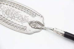 Silver spatula with engravings