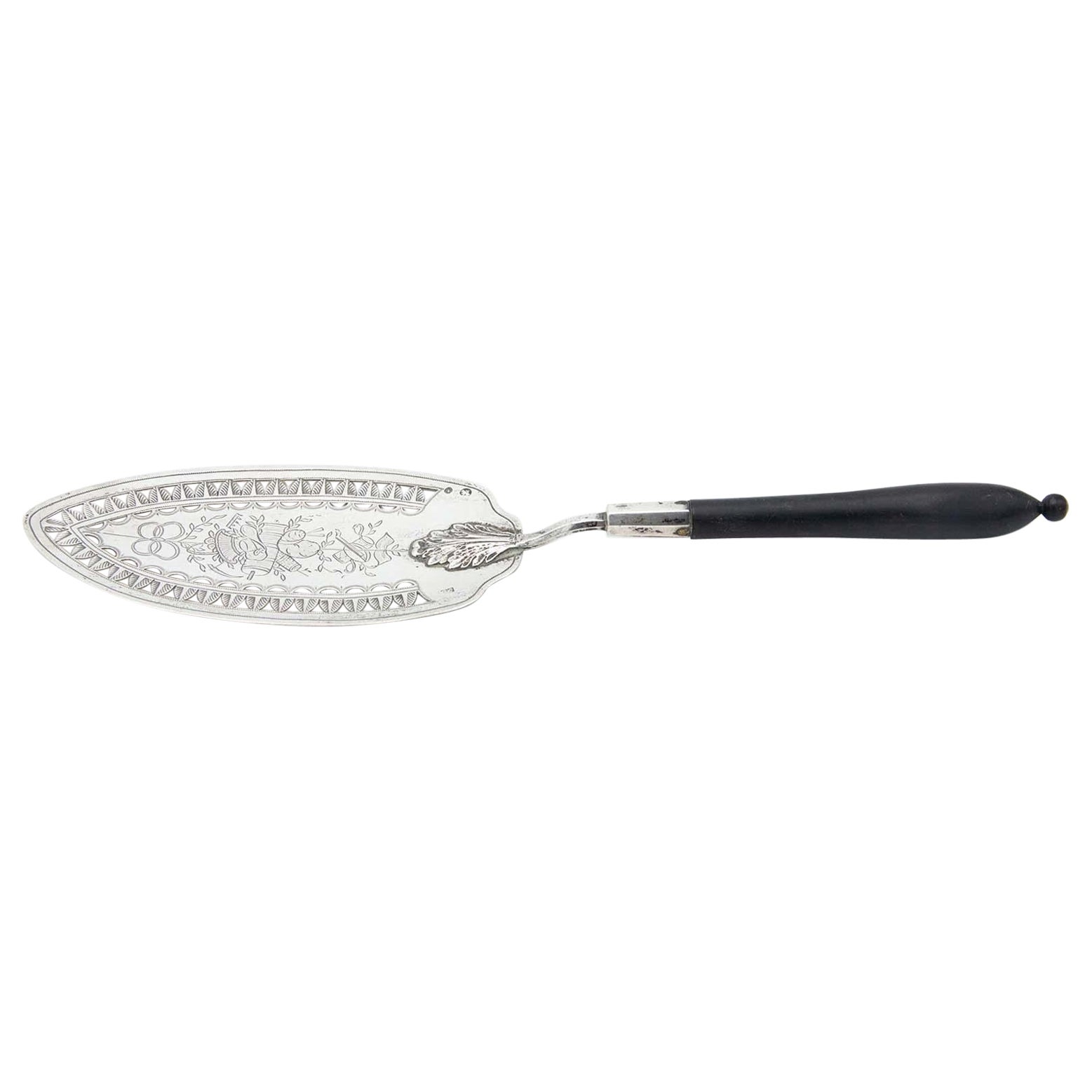 Silver spatula with engravings
