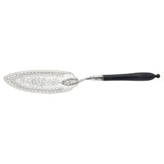 Silver spatula with engravings