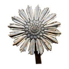 Silver splendor with raised floral motifs