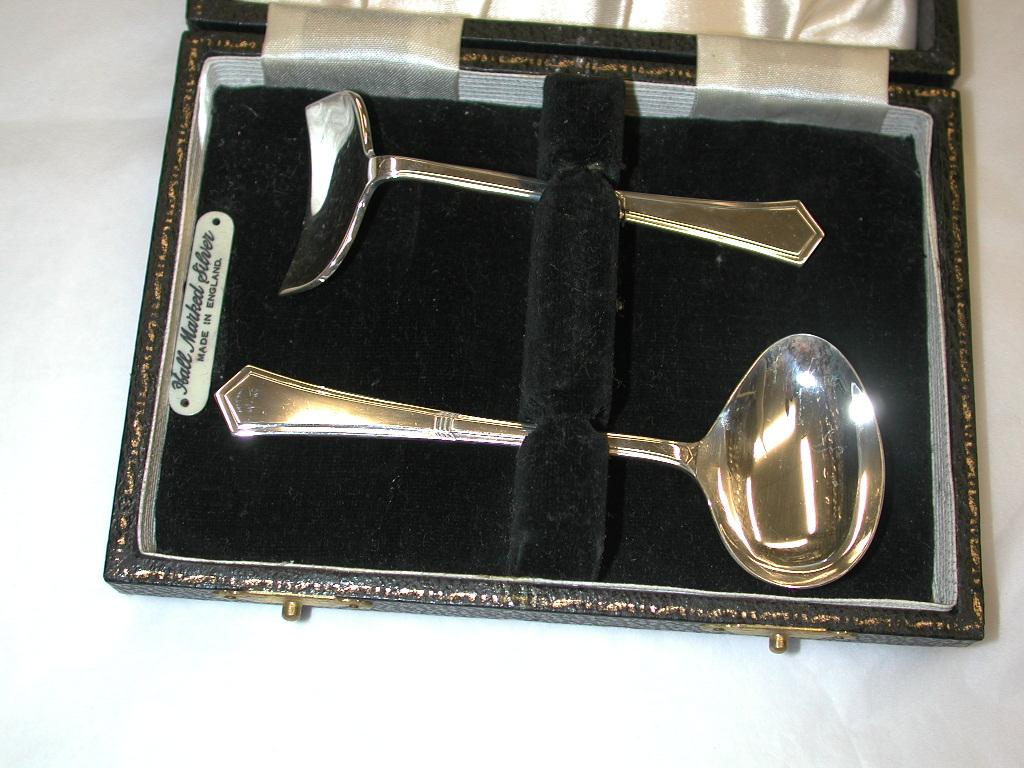 Silver spoon and pusher, dated 1957,
Made by the Angora silver plate company of Birmingham.
Makes an ideal christening present.