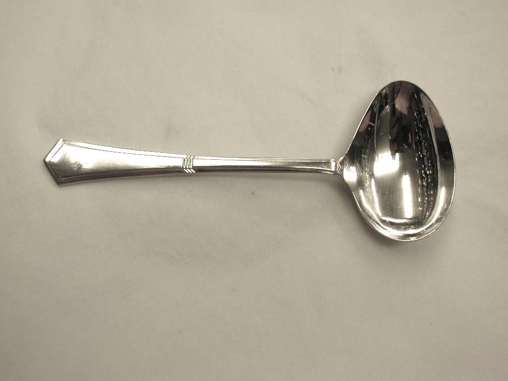 silver baby spoon and pusher