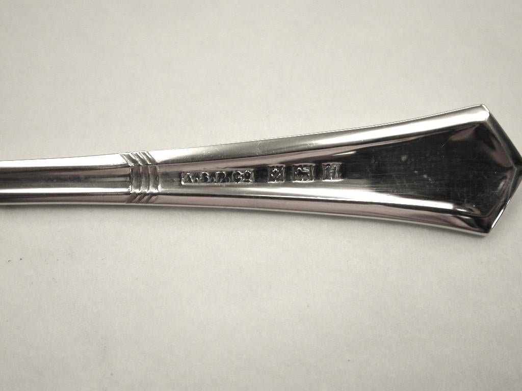 English Silver Spoon and Pusher, 1957