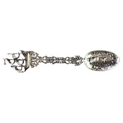 Silver spoon set with friezes, cutouts, caravel finial and coat of arms