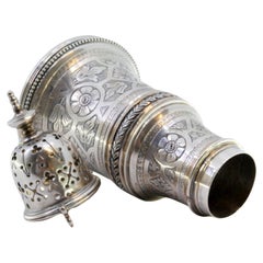 Silver sprinkler with chiseled acanthus flowers, leaves, and rim friezes