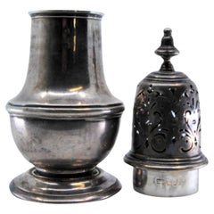 Silver sprinkler with smooth body and cut-out lid with appliqué