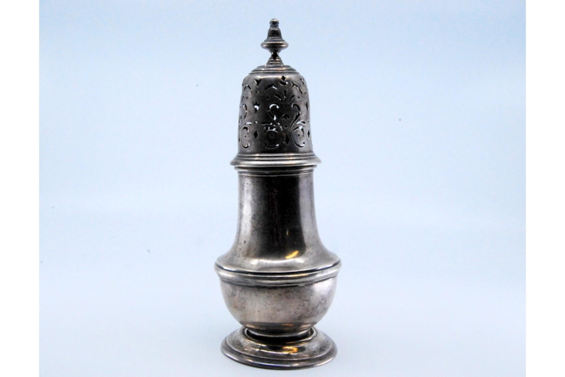Silver sprinkler with smooth body and cut-out lid with appliqué