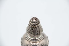 Silver sprinkler with spiral reliefs