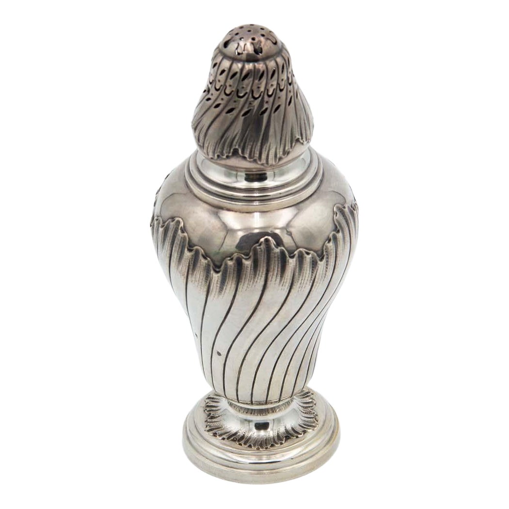 Silver sprinkler with spiral reliefs