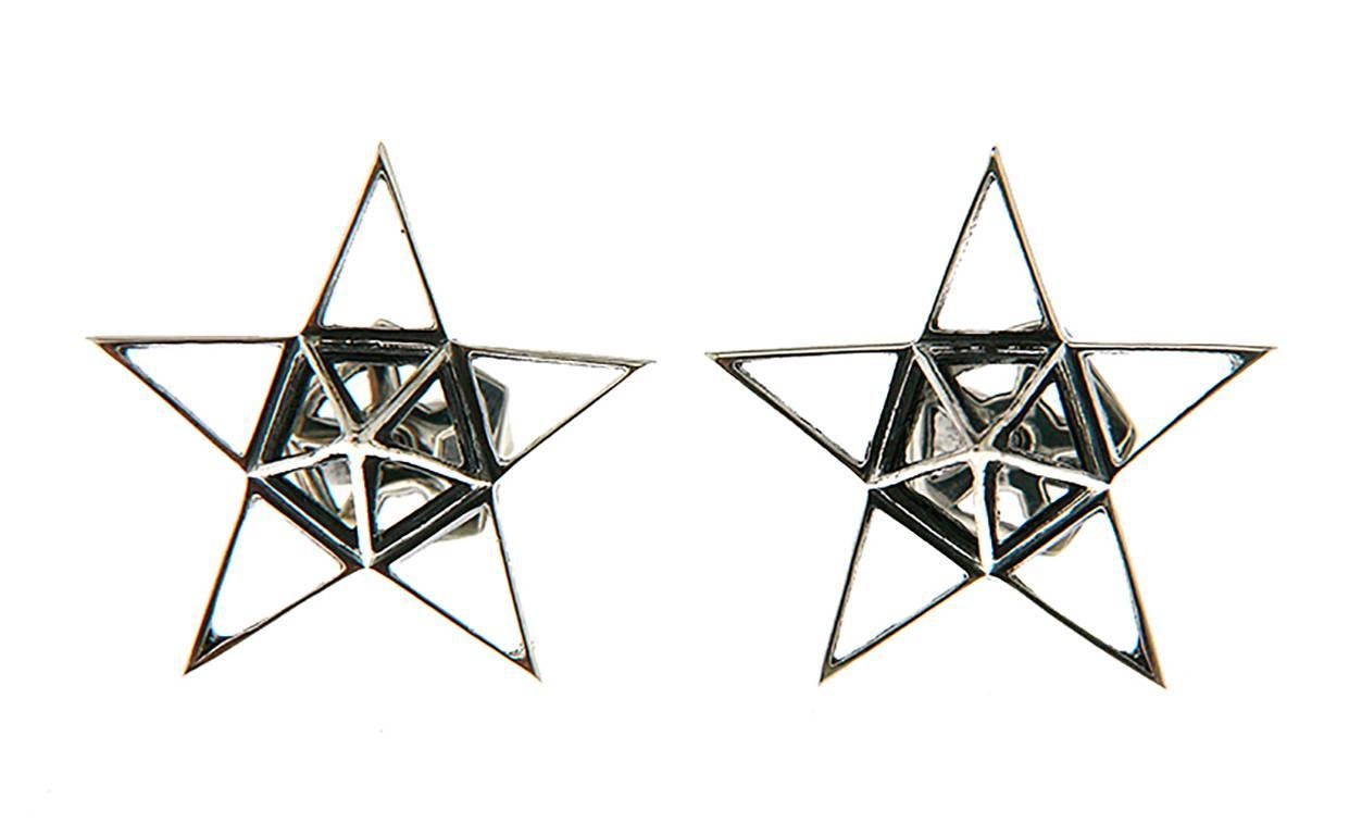 These Sterling Silver Star Stud Earrings are a statement of strength and power. Designer John Brevard used principles of sacred geometry to design these earrings for optimal strength and energy-capture. This piece is limited edition and designed for