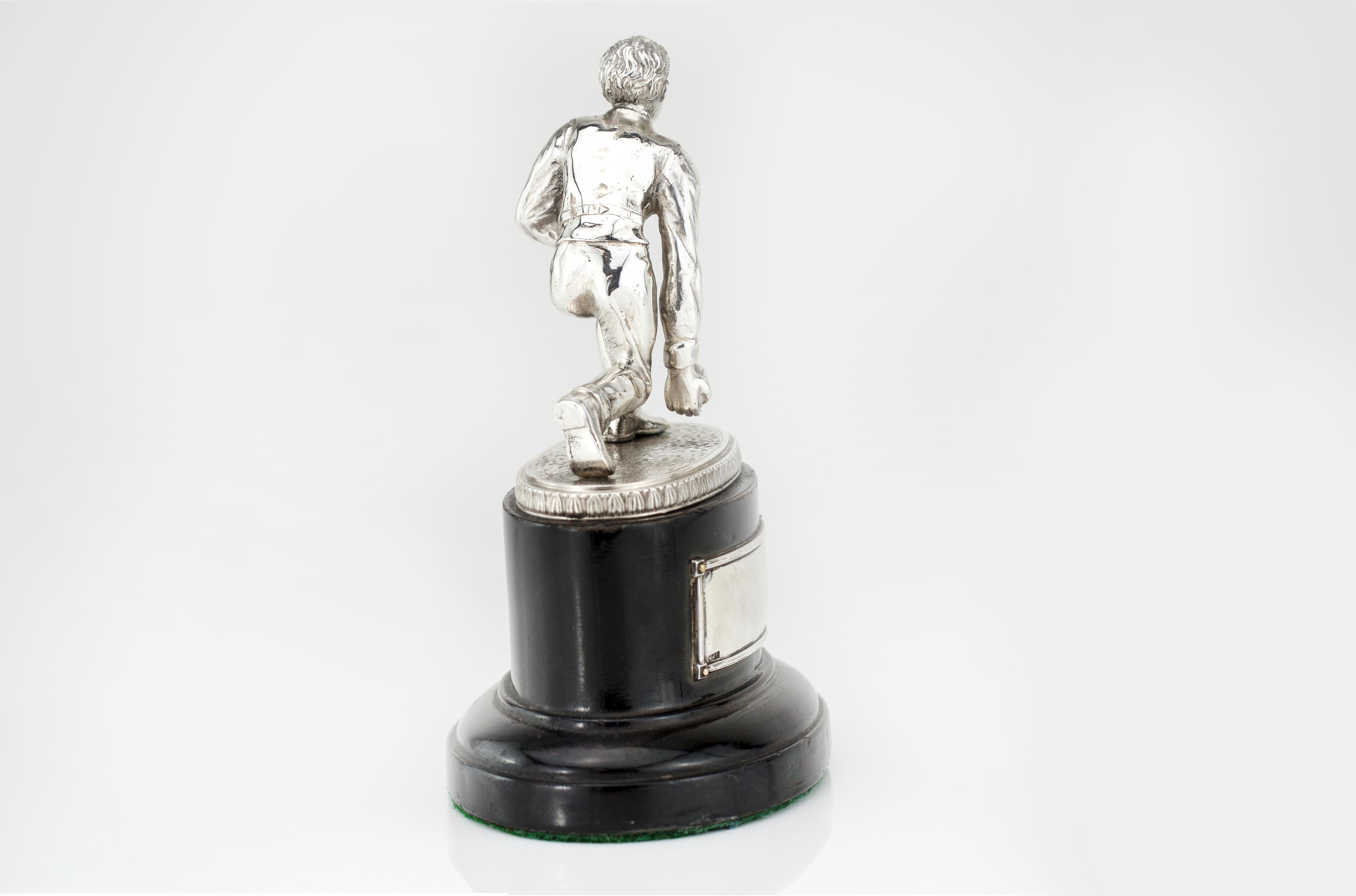 Art déco Statue en argent « Joueur de flûte » avec base en bois en vente