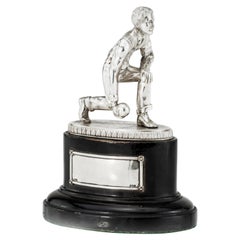 Used Silver Statue 'Bowling Player' with a Wooden Base