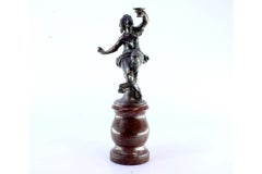 Silver statue of a female figure