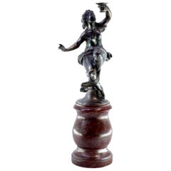 Silver statue of a female figure