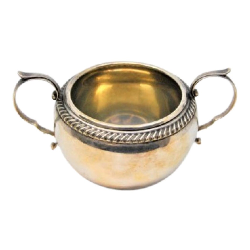Silver sugar bowl w/ scrolls, embossed w/ shells 
resting on 4 zoomorphic feet For Sale