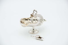 Silver sugar bowl with floral motifs and engraved branches
