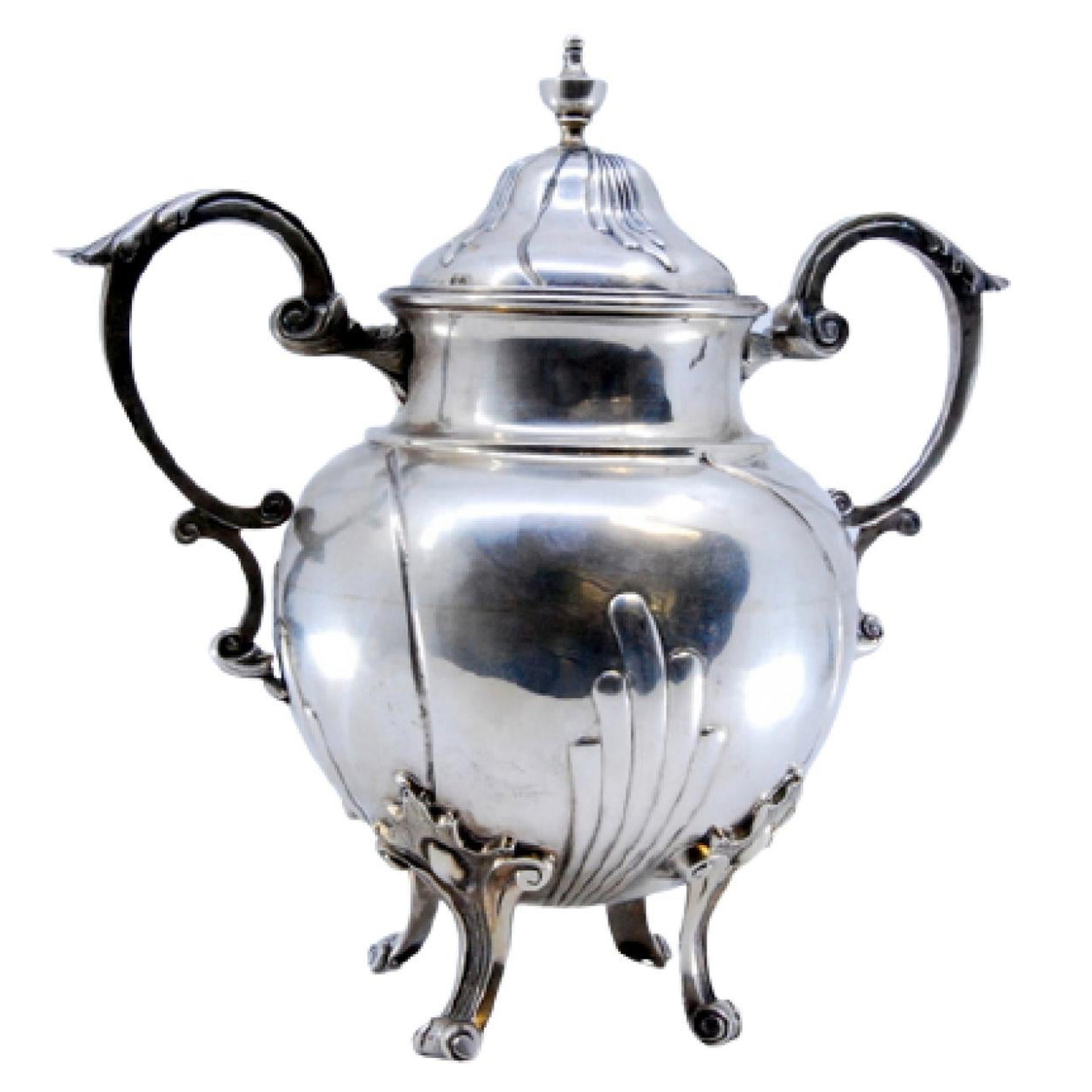Silver sugar bowl with scrolls, applied handles 
four feet