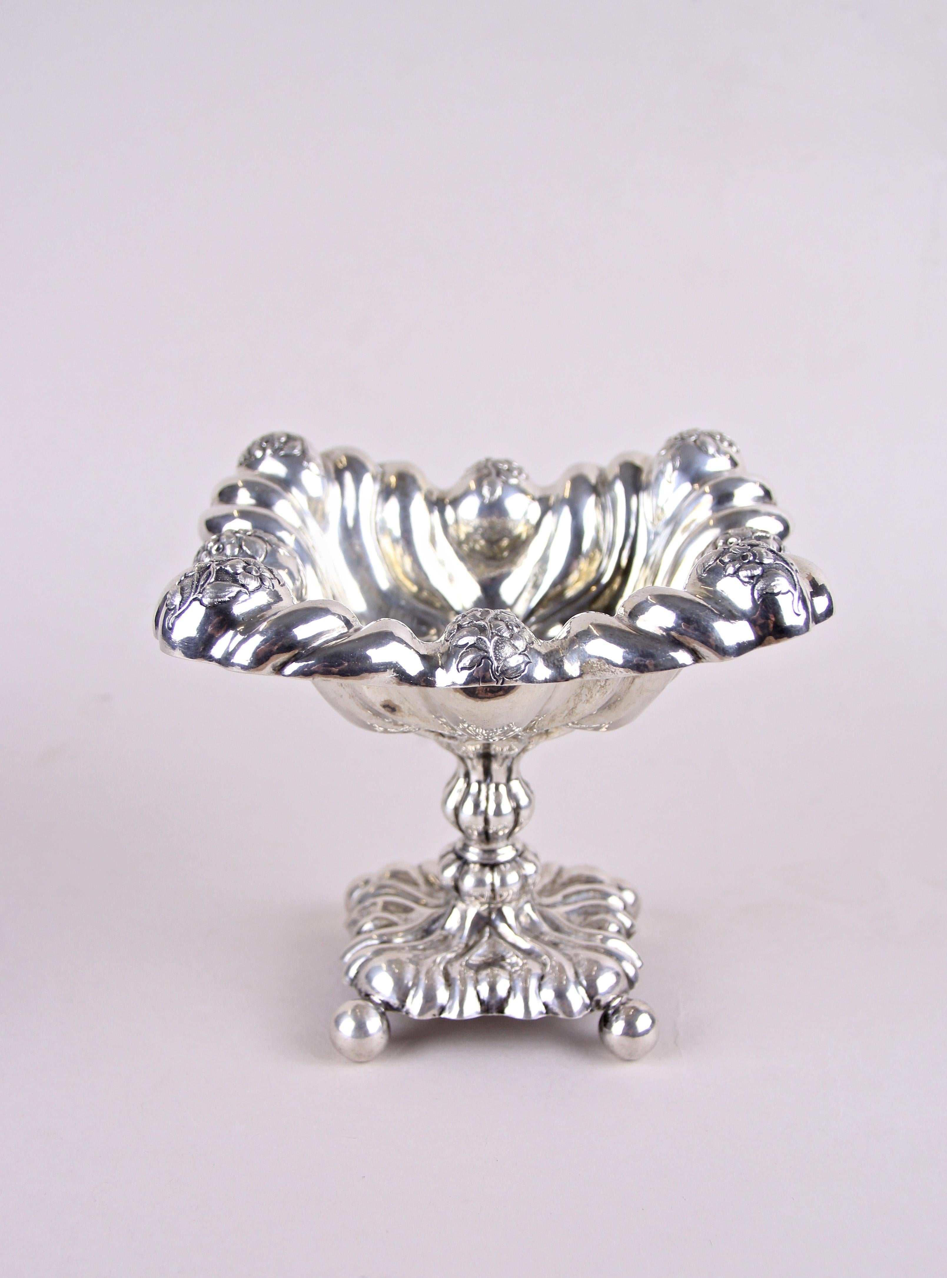 Superb silver Biedermeier sugar bowl with matching sugar tongs from Austria, circa 1840. Made out of 13 lot silver (812 silver) this breathtaking embossed silver sugar bowl fascinates trough its artfully made way. Also the sugar tongs fits perfect