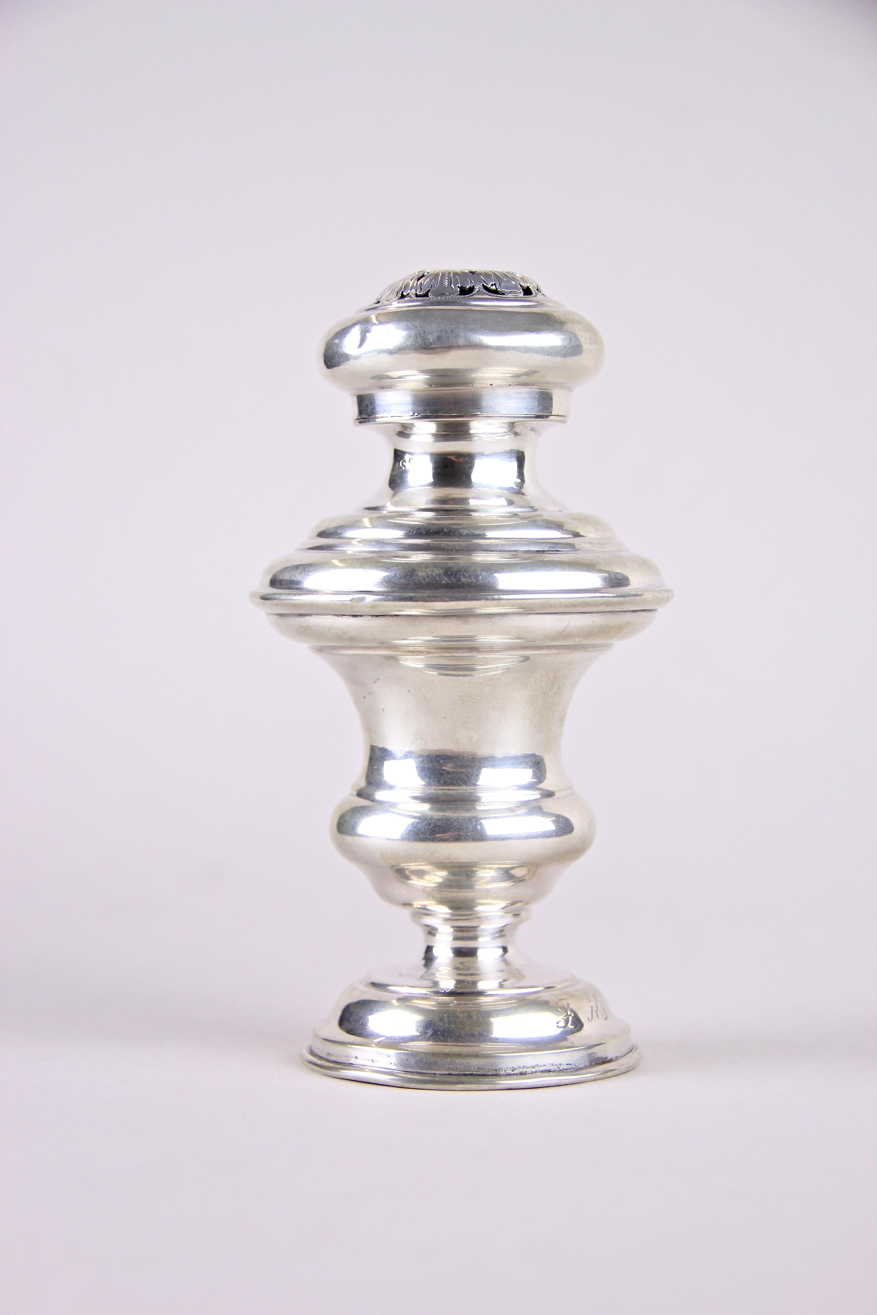 Enchanting silver sugar caster from the mid-19th century in Austria. This inventive shaped sugar caster was made out of 13 Lot silver, means Classic 812 silver. The beautiful designed cap can be lowered for refilling. This masterpiece was hallmarked