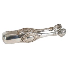 Pince à sucre en argent signée Louis Frédéric Guillaume Wolfers, seconde moitié du XIXe siècle.