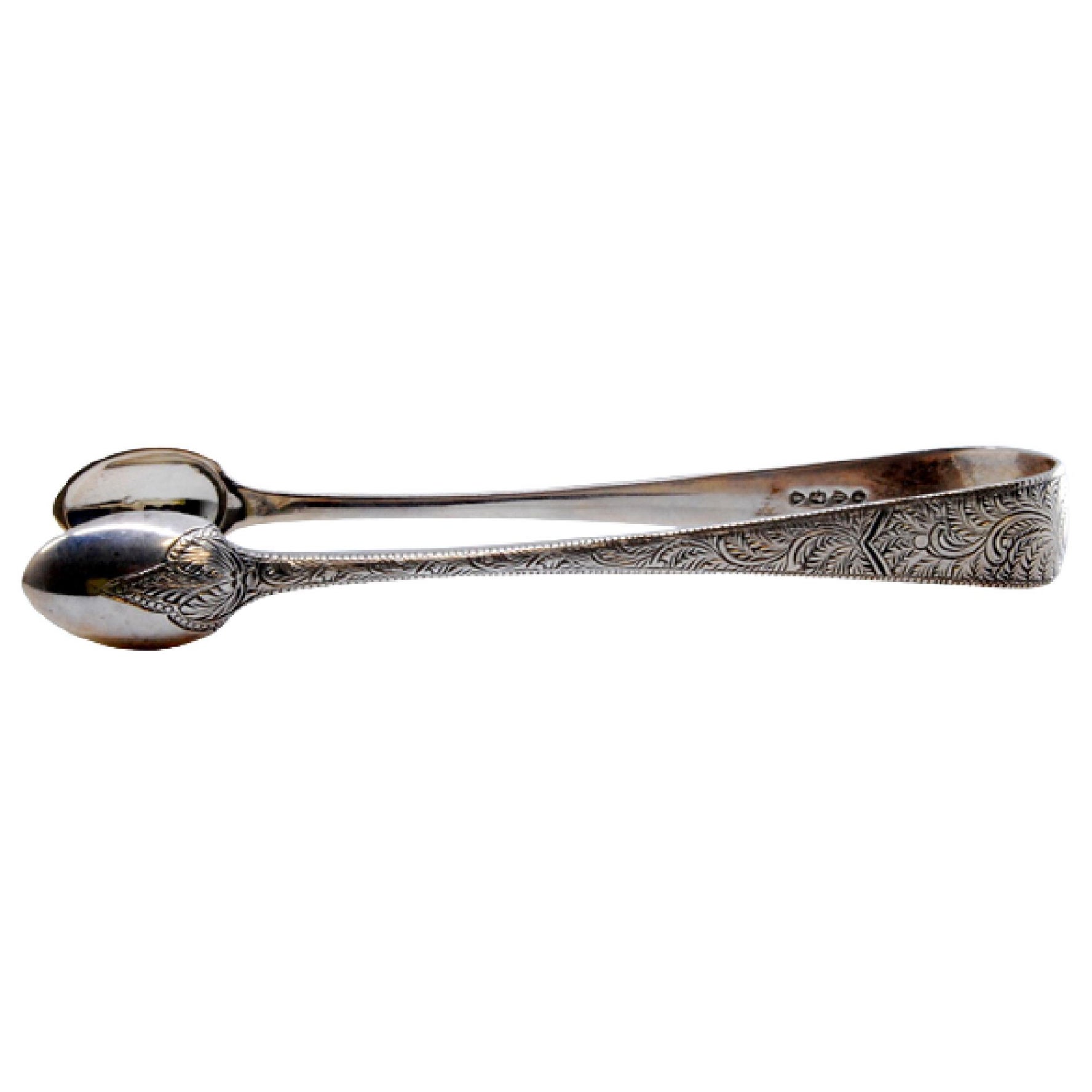 Silver sugar tongs with engraved plant motifs