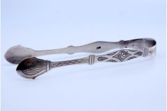 Silver sugar tongs with engraving