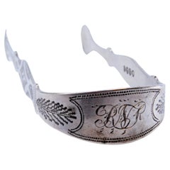 Silver sugar tongs with engraving