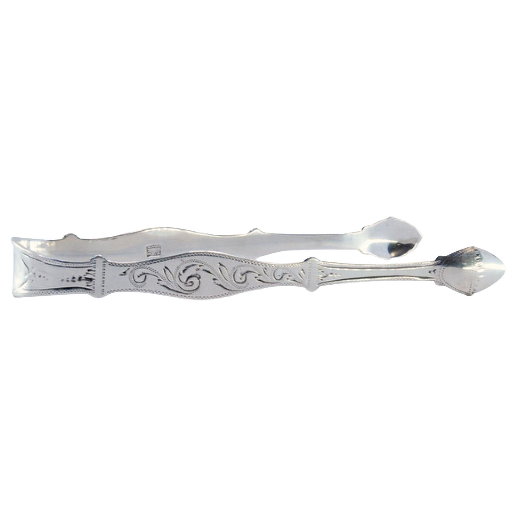 Silver sugar tongs with engraving on both sides