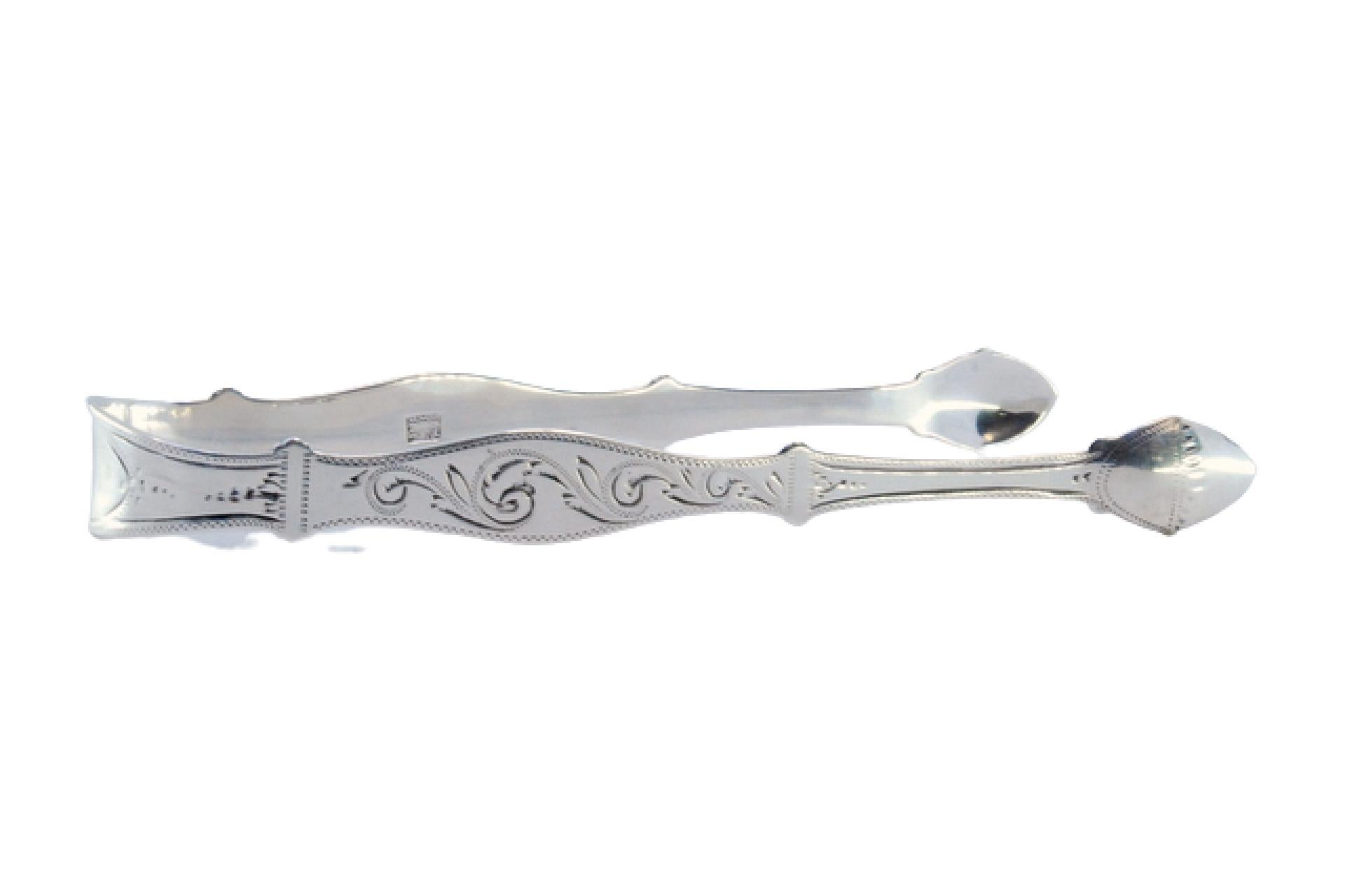 Silver sugar tongs with engraving on both sides