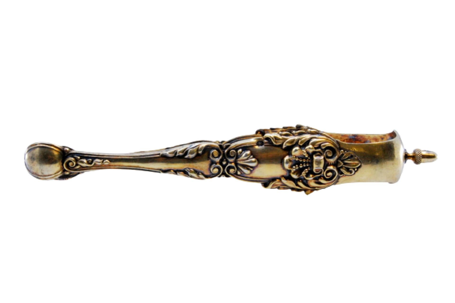 Silver sugar tongs with gold reliefs and applications For Sale