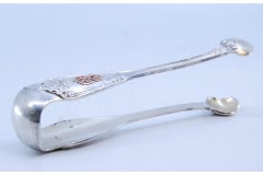 Silver sugar tongs with traces of gold on both sides