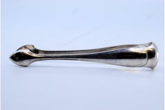Silver sugar tongs with trim