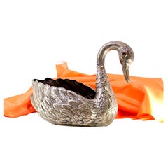 Silver swan-shaped flowerpot with raised feathers and articulated head