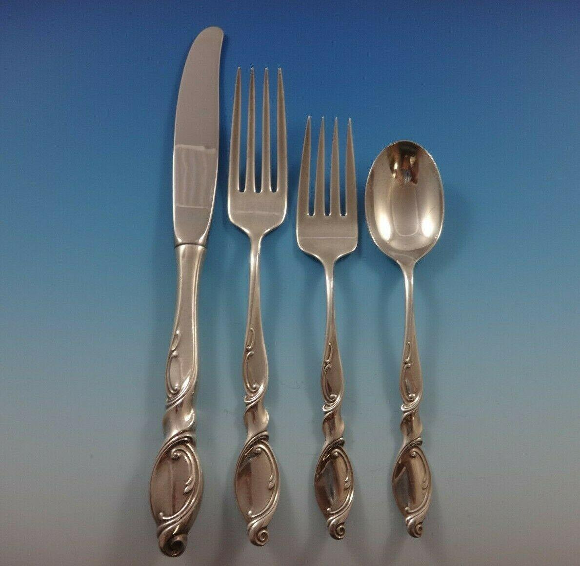Silver Swirl by Wallace sterling silver Flatware set - 30 pieces. Great starter set! This set includes:

6 knives, 9