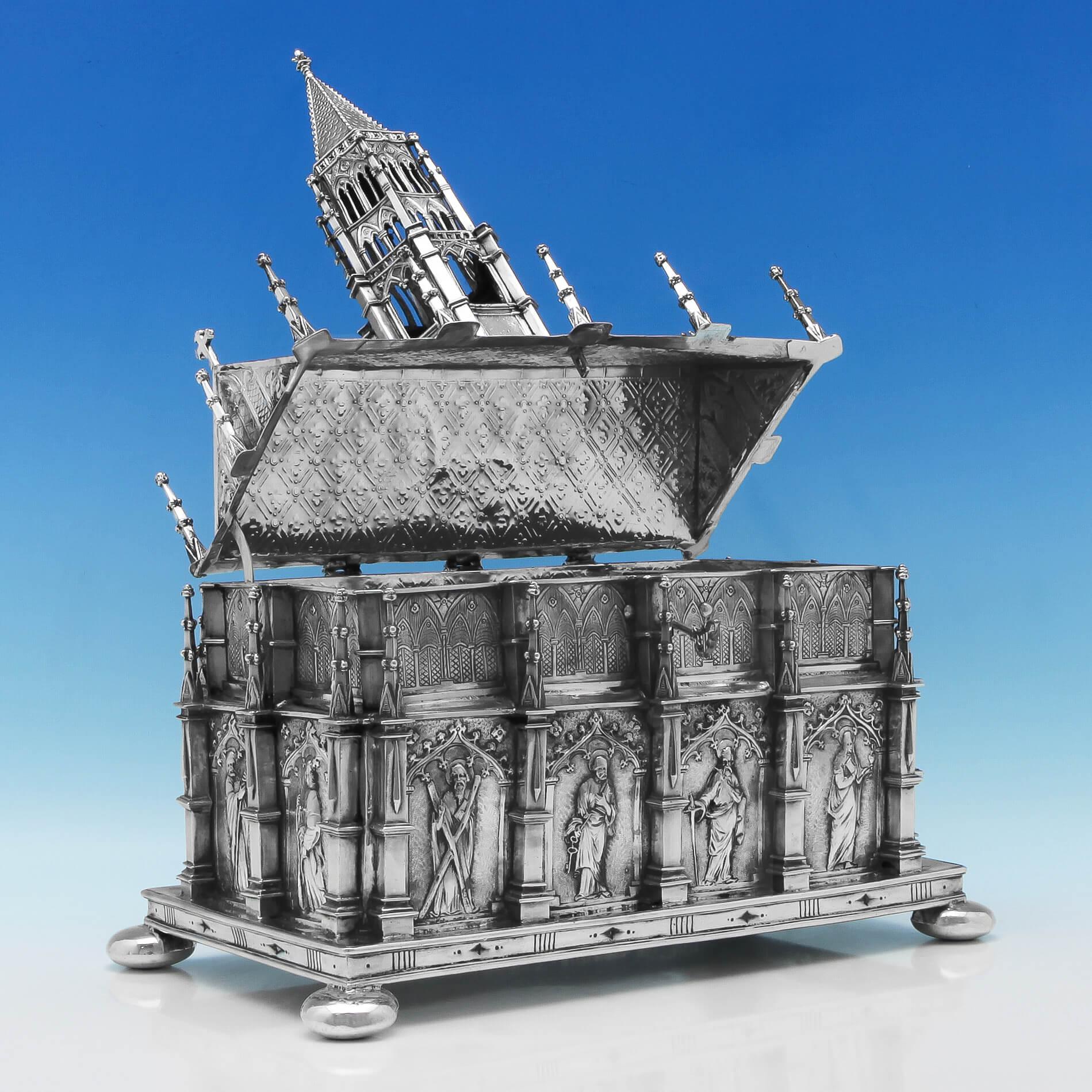 Made circa 1890, this wonderful and unusual, Victorian, Antique, German silver tabernacle box, or Reliquary, is in the form of a church, with a lockable hinged roof. It has been decorated with chased scenes depicting the 12 apostles. The box