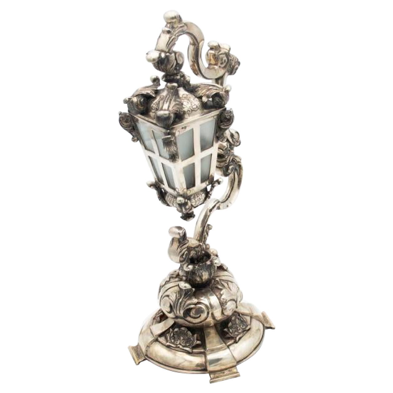 Silver table lamp with high reliefs