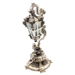 Silver table lamp with high reliefs
