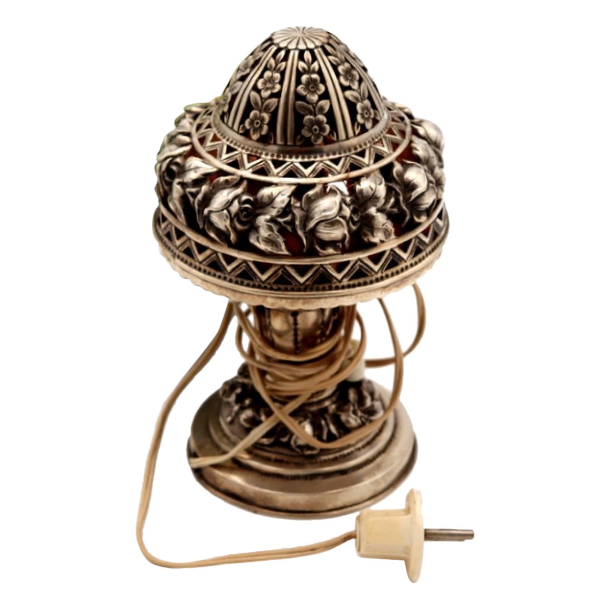 Silver table lamp with scalloped and embossed floral reliefs