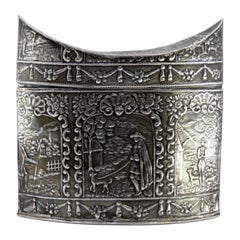 Silver tea box revealed with a knight in a country setting in the Dutch style