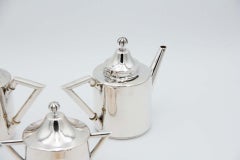 Silver tea service with coffee pot, teapot, sugar bowl and milk jug