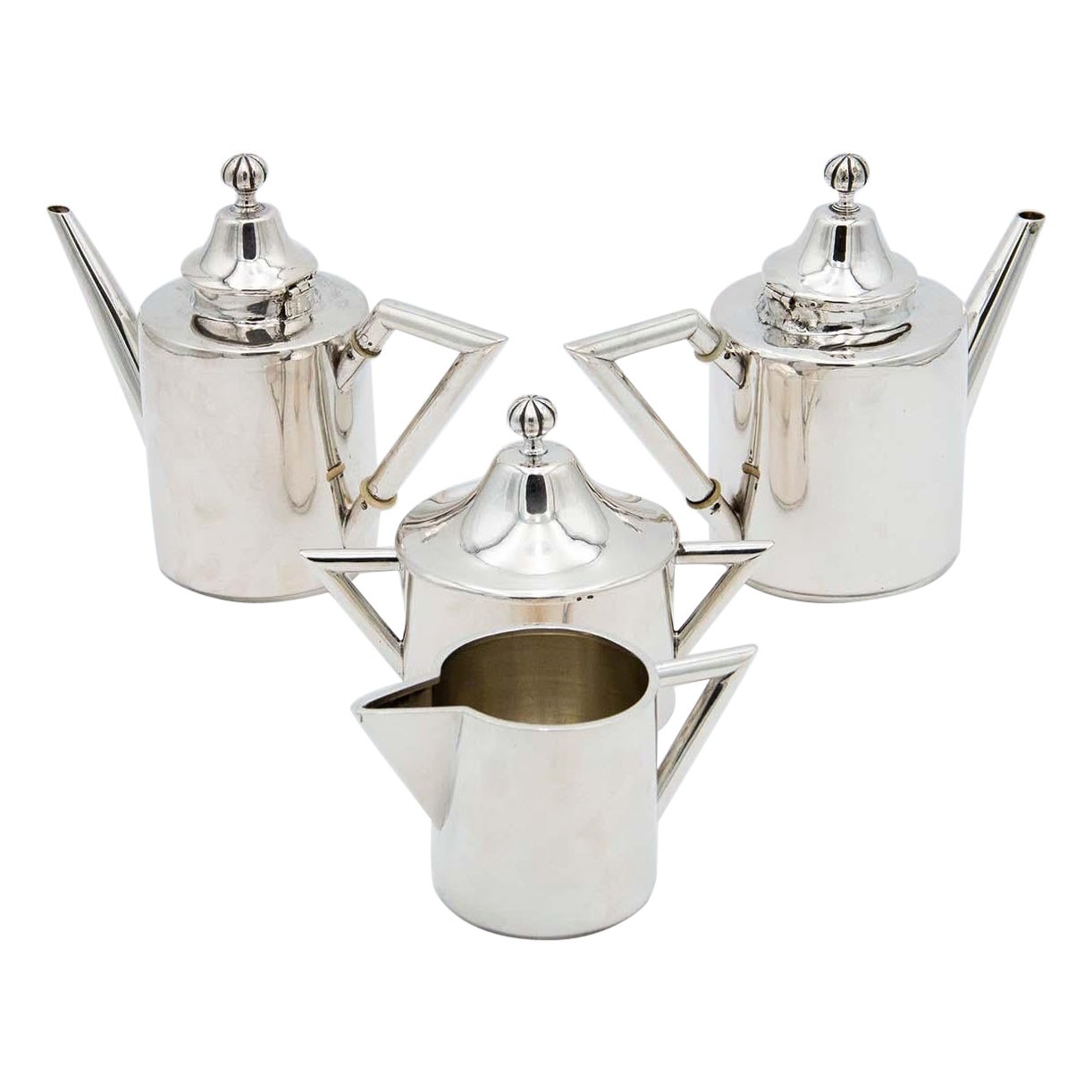 Silver tea service with coffee pot, teapot, sugar bowl and milk jug For Sale