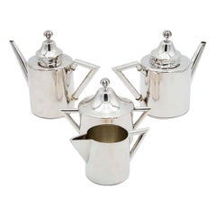 Silver tea service with coffee pot, teapot, sugar bowl and milk jug