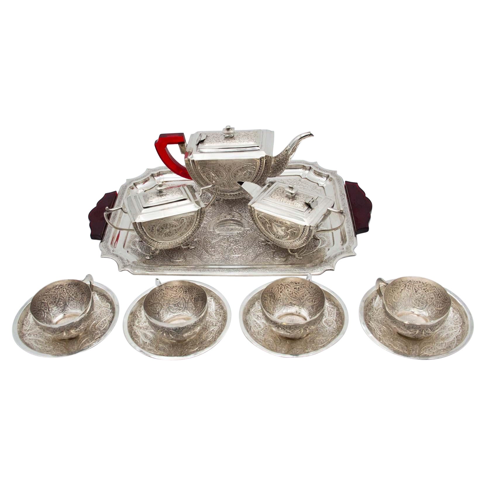 Silver tea service with tray, cups, saucers, teapot, coffee pot and sugar bowl For Sale