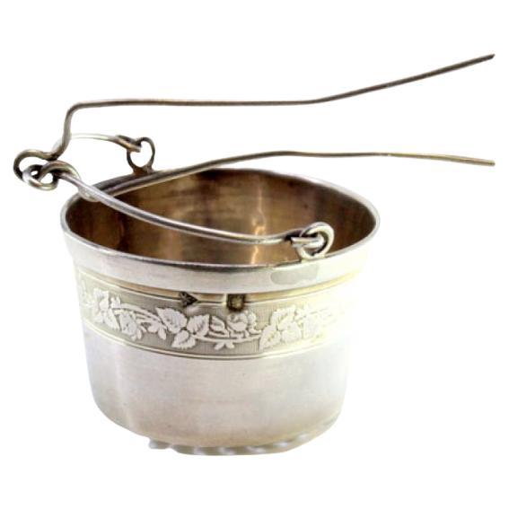 Silver tea strainer with engraving and hinged handle