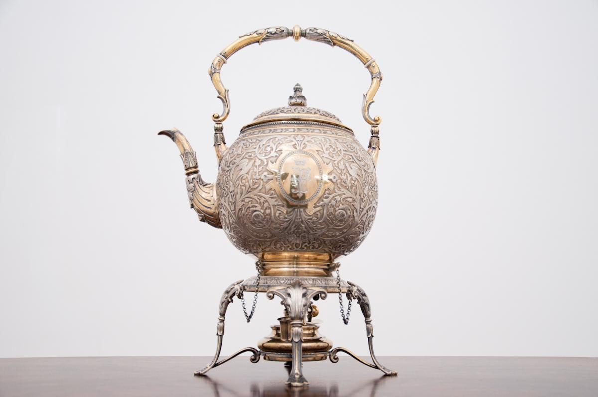 Silver teapot with a drip cap with gilded elements, the master's attribute 