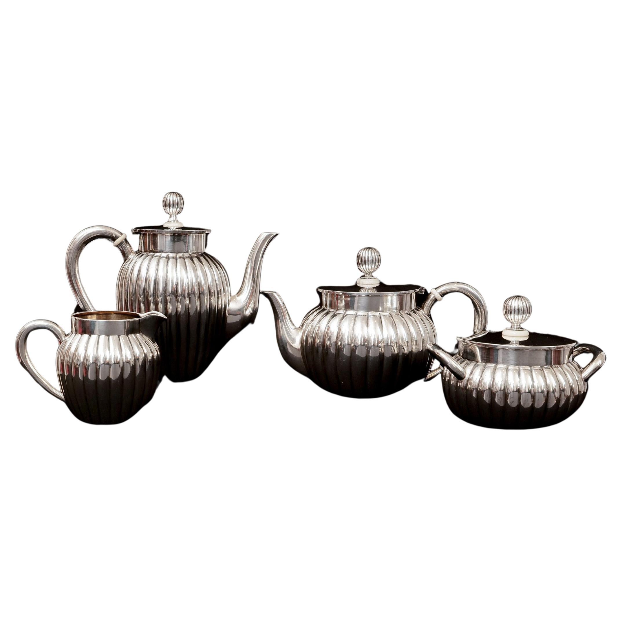 Tea core, set of tea and mocha pot, milk and sugar, Grachev brothers St. Petersburg, court jewelers of the tsar, date of origin 1899 - 1908, silver, total weight 1.215 grams, hallmarks master mark 
