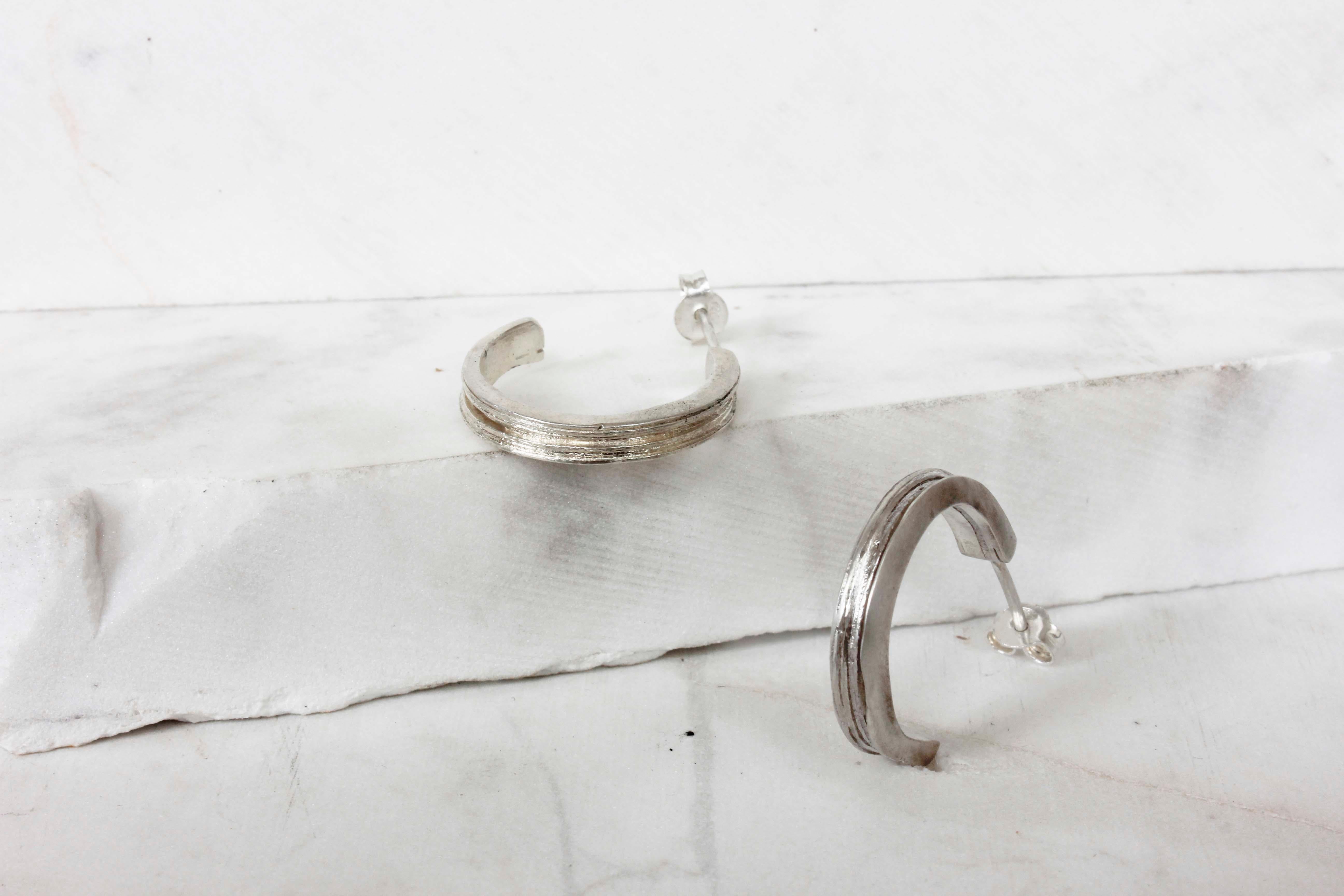 Silver Textured Hoops

Made from eco silver sheets soldered together, in order to create this unique texture of layers.

Hoop earrings are a basic style staple for any woman, it is perfect for the days when you just want to keep it clean and