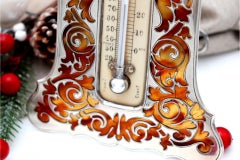 Silver thermometer with reliefs, table stand and hanging ring